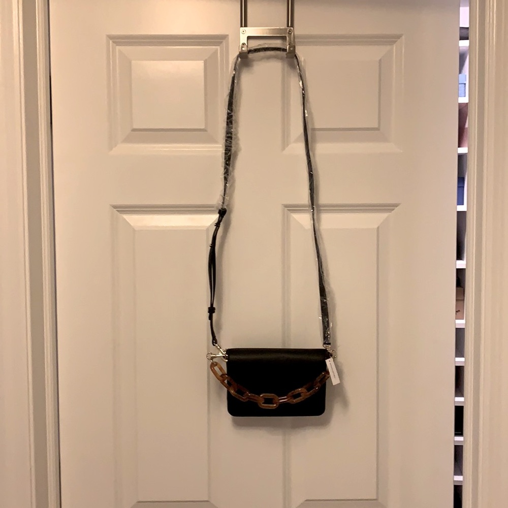 Perfect mini leather cross body bag with adorable tortoise chain detail